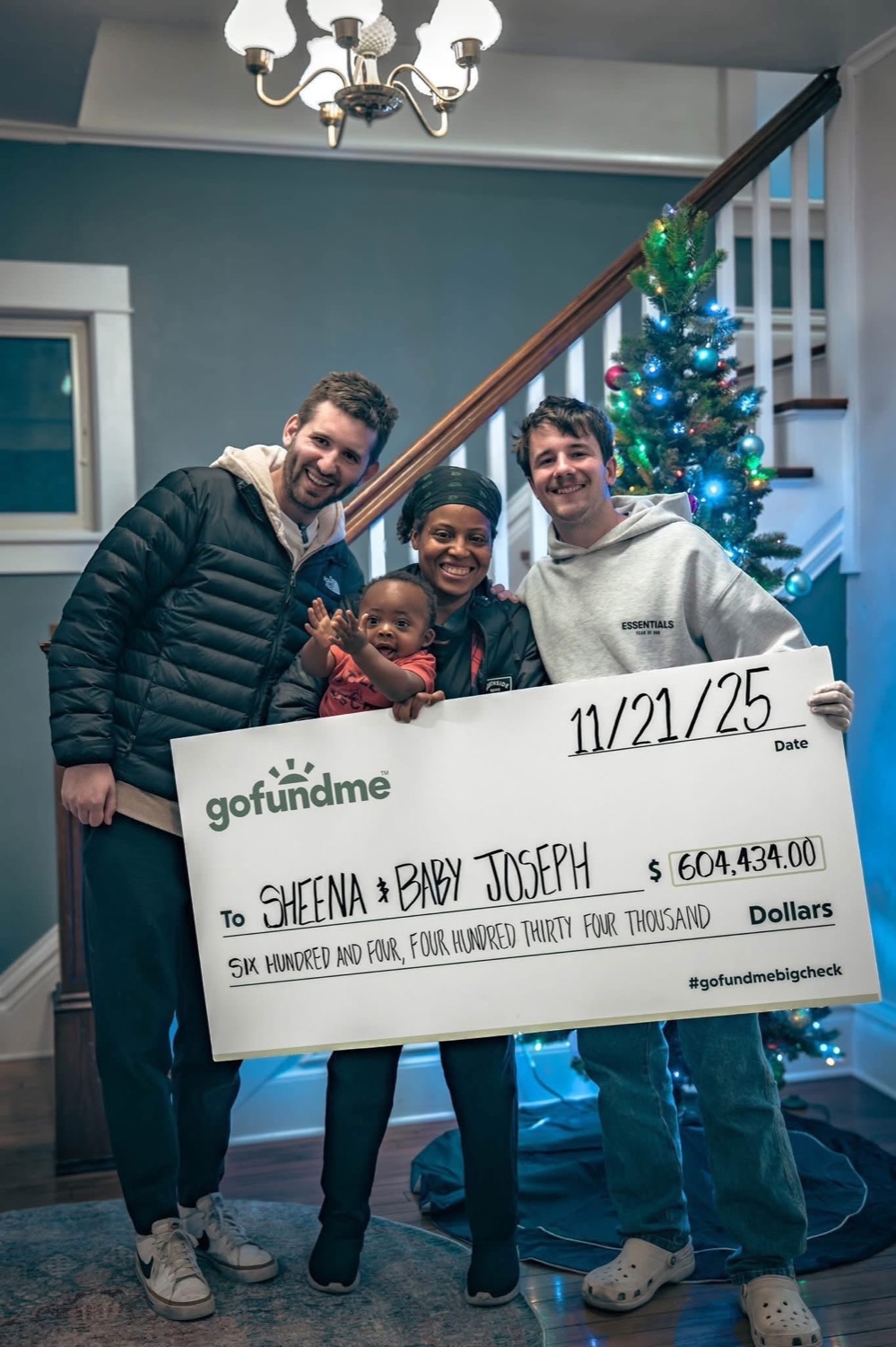 Josh Liljenquist with Sheena, Baby Joseph, and a GoFundMe check