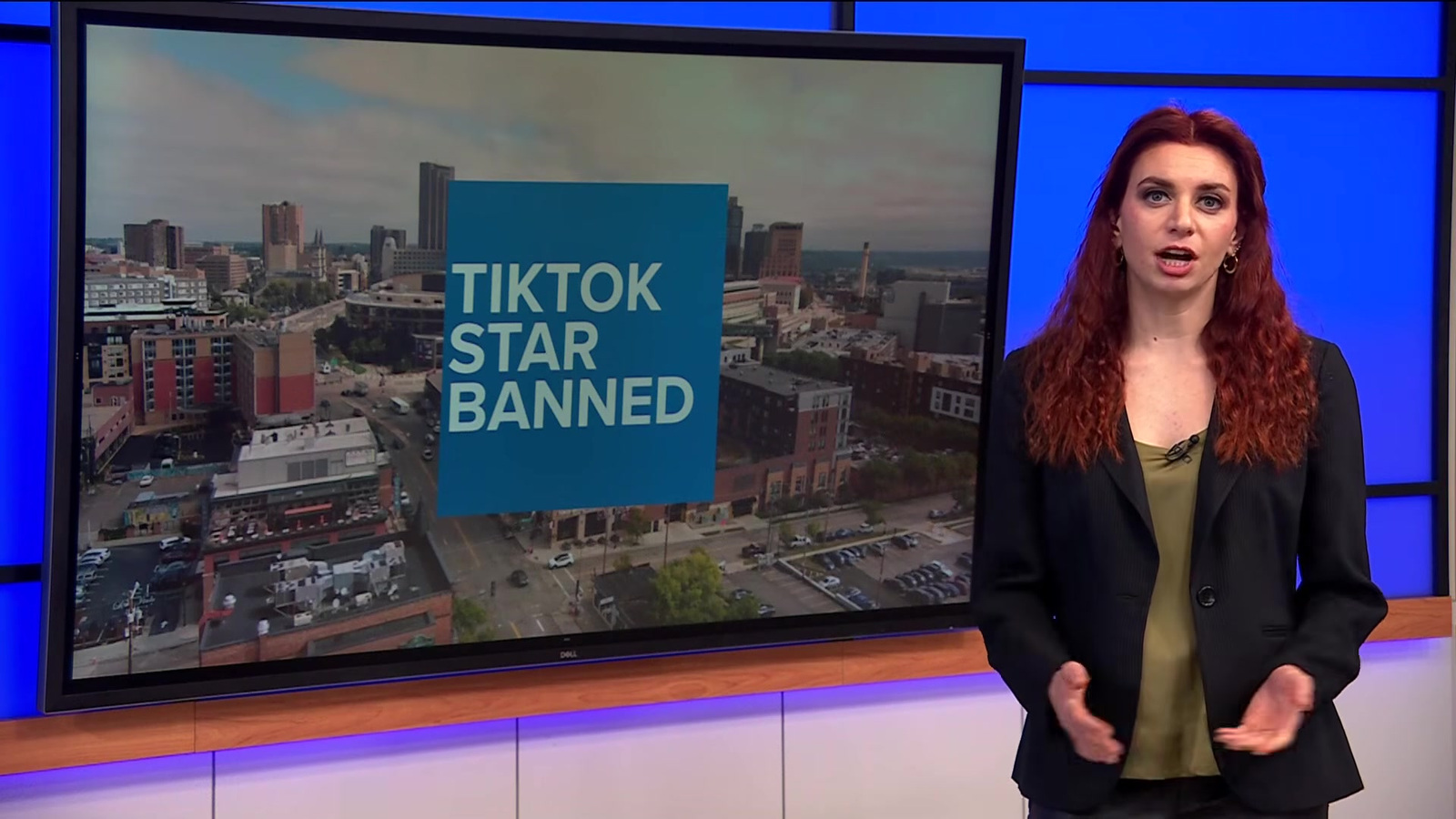 KARE 11 journalist Audrey Russo stands beside a studio display reading TikTok Star Banned during the full report about Josh Liljenquist’s St. Paul parks restriction.