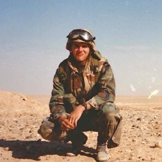 Josh’s father in Army uniform in a desert setting during his military service