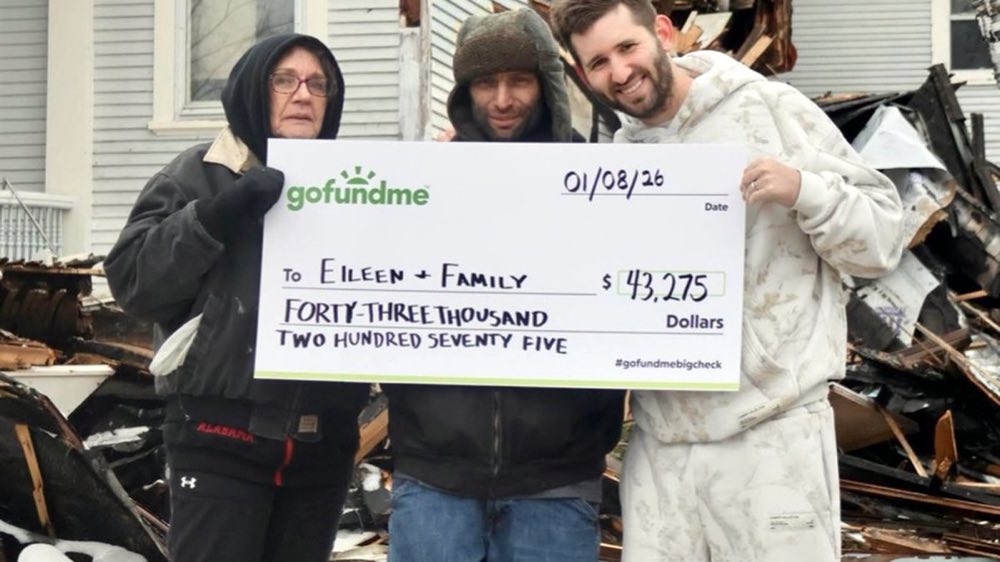 Josh Liljenquist with Eileen's family after house fire recovery support
