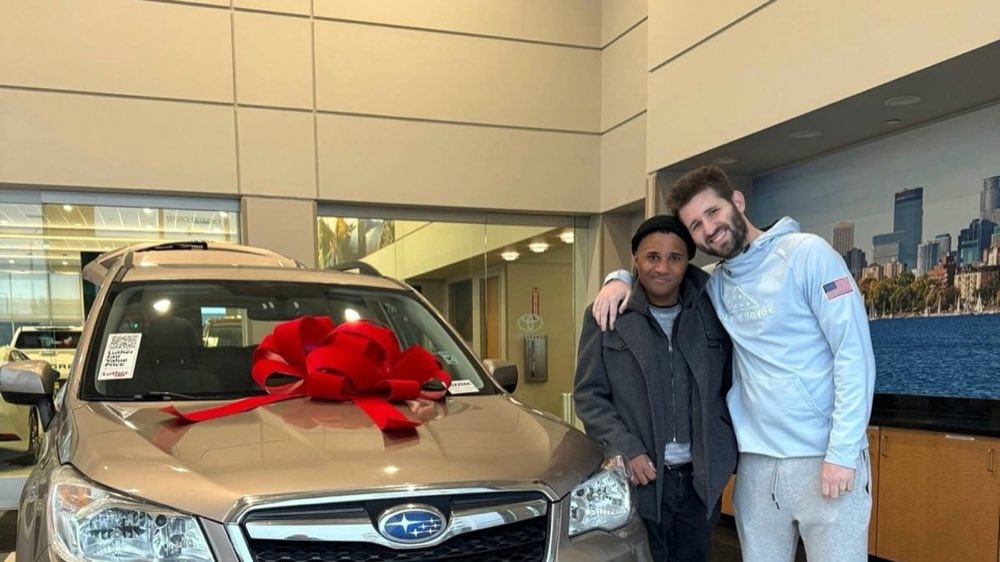 Josh Liljenquist with Xavier after the car fundraiser