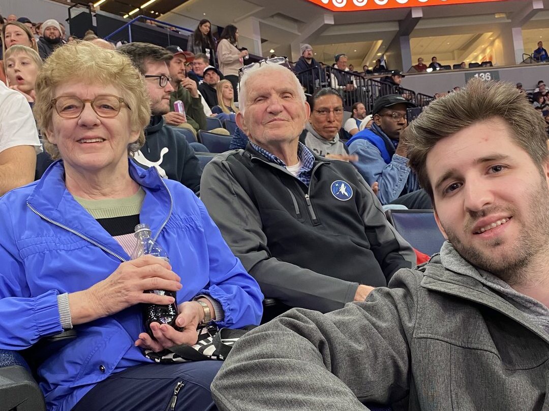 Corrine Liljenquist with her husband Lee Liljenquist and grandson Josh Liljenquist at a basketball game.