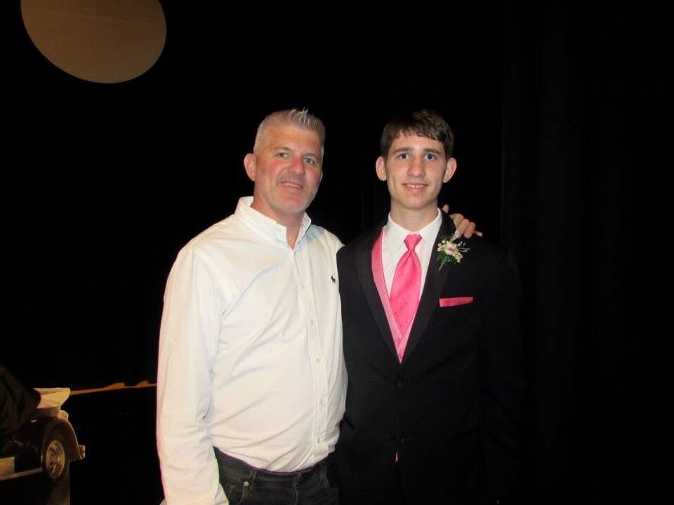 Josh Liljenquist with his father, Trent Lee Liljenquist, at a formal event during Josh's younger years.