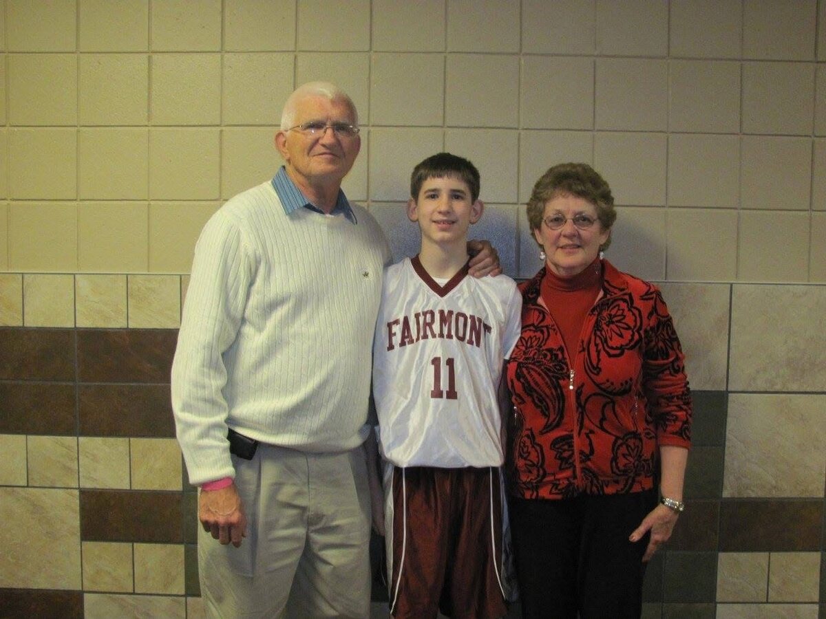 A young Josh Liljenquist in his Fairmont basketball uniform with his grandparents Lee and Corrine Liljenquist.