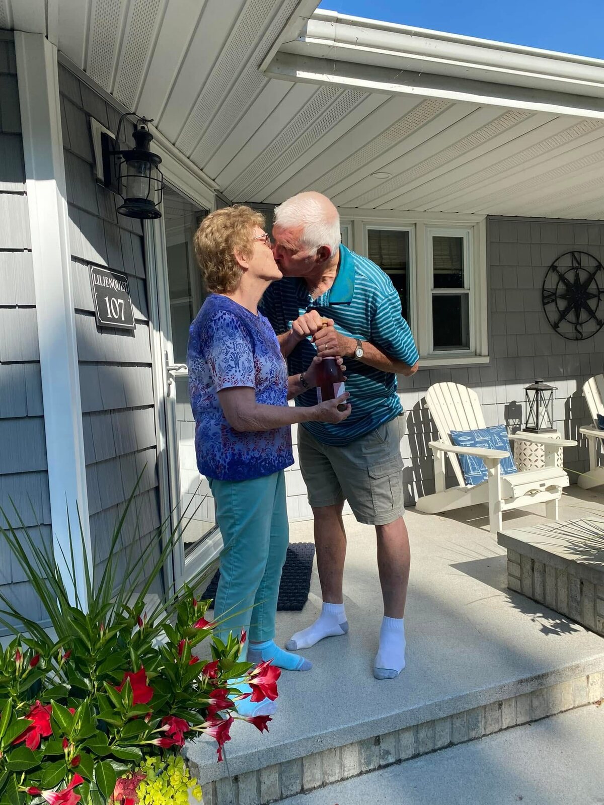 Lee and Corrine Liljenquist sharing an affectionate moment outside.