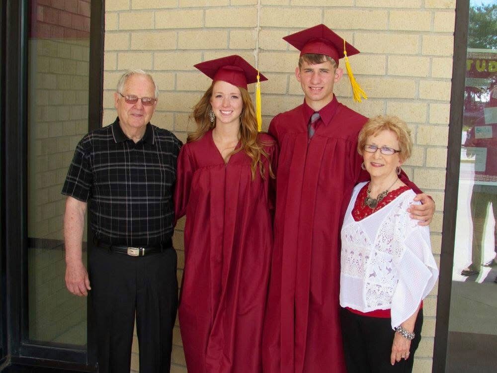 Mary and Tom Westcott with Josh Liljenquist and another family member at a graduation.