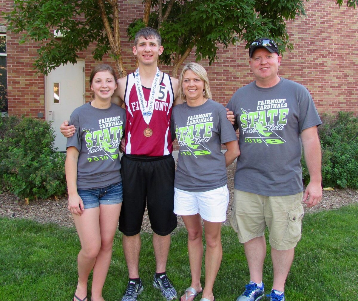 Josh Liljenquist with Carrie and Mark Westcott after the 2016 Minnesota State Track and Field Meet.