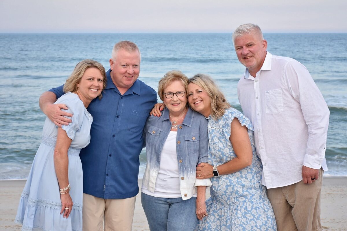 Carrie and Mark Westcott with adult members of the extended Westcott family on a beach trip.