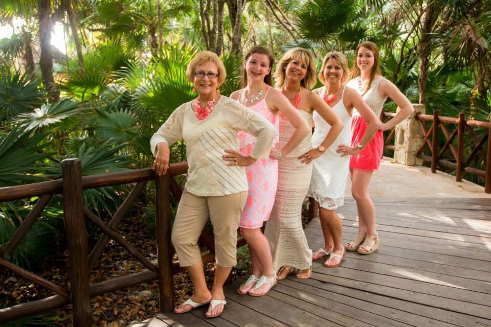 Carrie Westcott with women from the extended family during a tropical family trip.