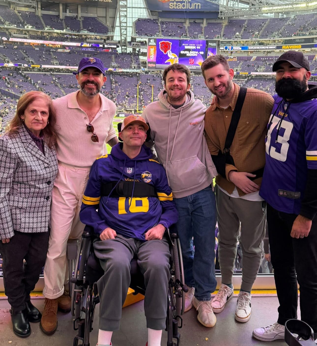 Josh Liljenquist and ItsSozzer with a participant during a surprise field-experience project at U.S. Bank Stadium.