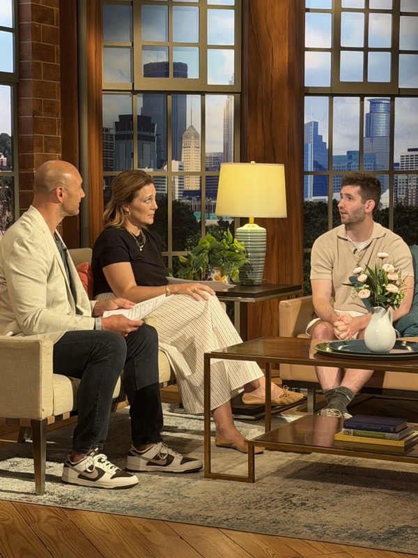 Josh Liljenquist speaking with two Twin Cities Live hosts on the KSTP studio set.