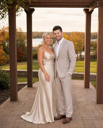 Josh Liljenquist and his wife in a formal outdoor wedding portrait